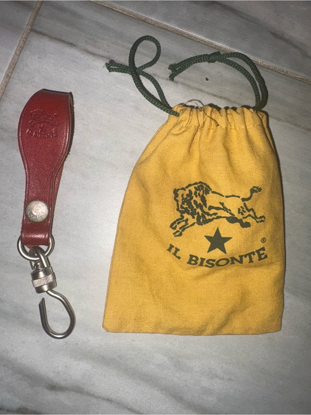 Authentic il bisonte Red Leather Key Holder with Yellow Drawstring Pouch